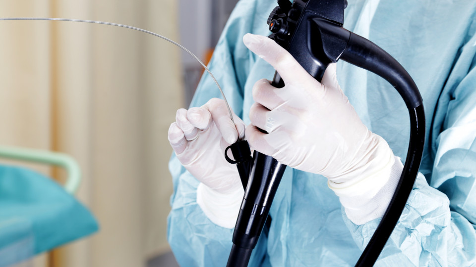Medical Professional With Endoscopy Tool